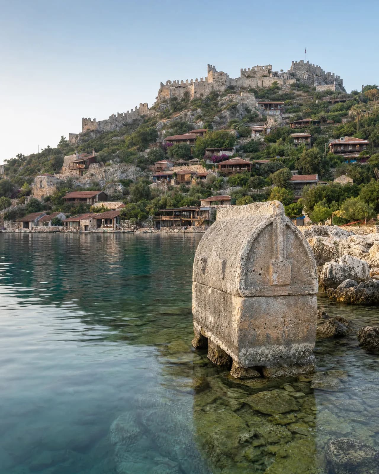 A Lycian sarcophagus in the shallows below Simena castle, Kekova