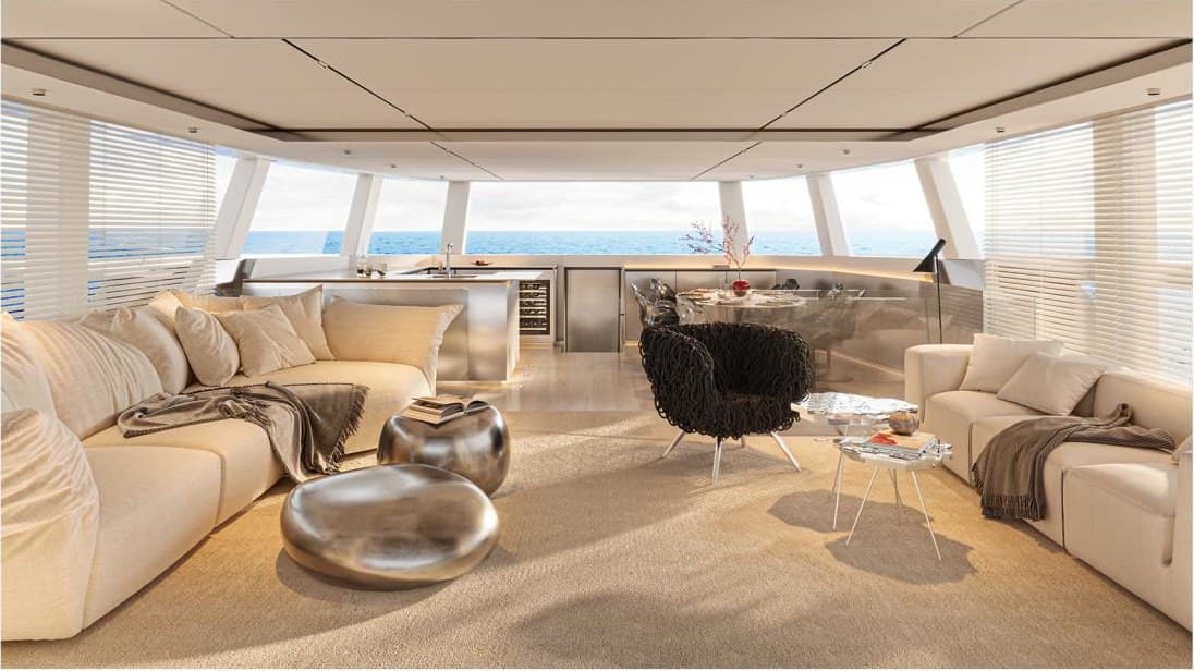 SUE ROSSO's main salon — deep sofas, sea on three sides